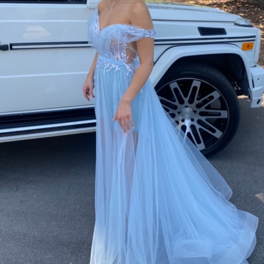 Off shoulder Light blue gown, with a skirt underneath the sheer